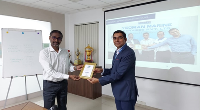 Mr. Dhananjay Mishra CMD of YMPL Presented Memento to Mr. G.S. Selwyn MD of MTU( India)